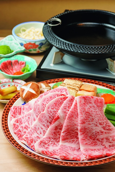 Kyoto-style sukiyaki for one 8,778 yen (photo shows two servings). Includes appetizer, yukke and dessert.