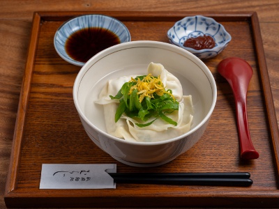 The interior intentionally retains the antiquated look of an old house. The atmosphere is chic and calm.