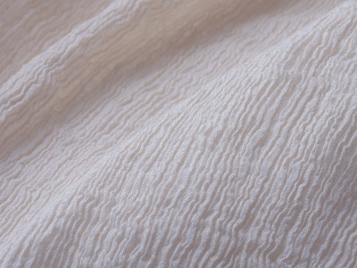 天然素材を使った、デコボコとしたプリーツ状の生地が肌と外気の温度を調整。いつも快適に使用できる。