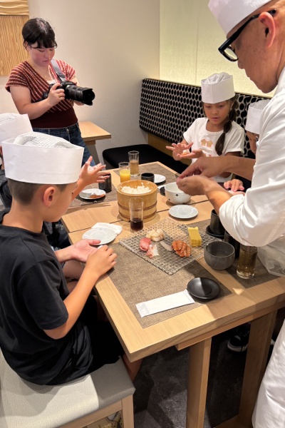 An optional matcha tea ceremony experience in the tea room, available with the sushi-making experience.