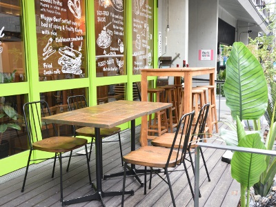 Enjoy a relaxed resort atmosphere at the open-air terrace seating.