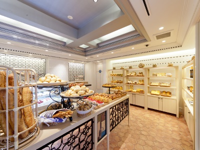 A wide variety of breads and colorful sweets are available.
