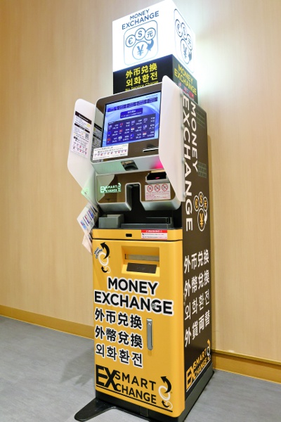 Install a foreign currency exchange machine.