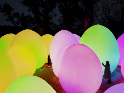In “Forest of Autonomous Resonating Life - Eucalyptus ,” giant ovoid trees stand in a row, and as they are moved by people or blown by the wind, their light changes color and responds to their surroundings.