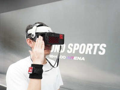When playing, players wear special goggles and arm sensors. The player fights against the opposing team by producing energy balls and shields from his or her hands.
